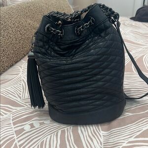BCBG Paris Black Quilted Shoulder Bag with Tassel Accents